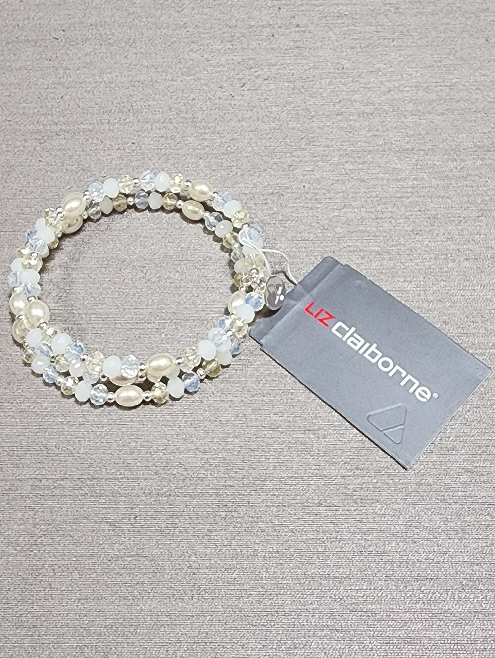 LIZ CLAIBORNE WHITE TONES COIL BRACELET NEW WITH TAG